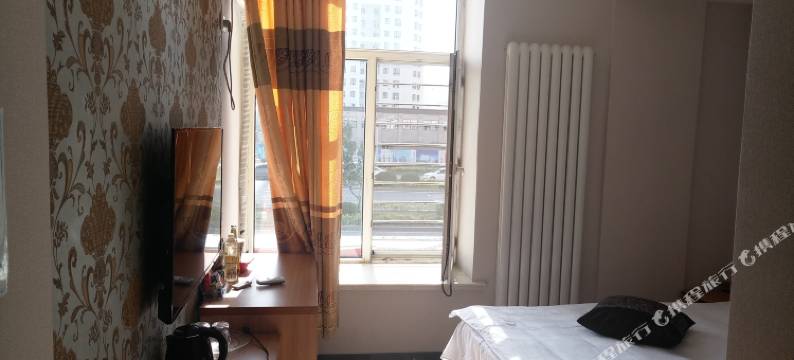 哈尔滨旺龙休闲宾馆松北商业大学冰雪大世界店图片