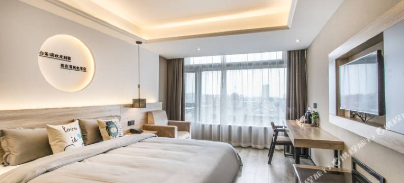 迷白艺术酒店(苏州吴江盛泽东方纺织城店)图片