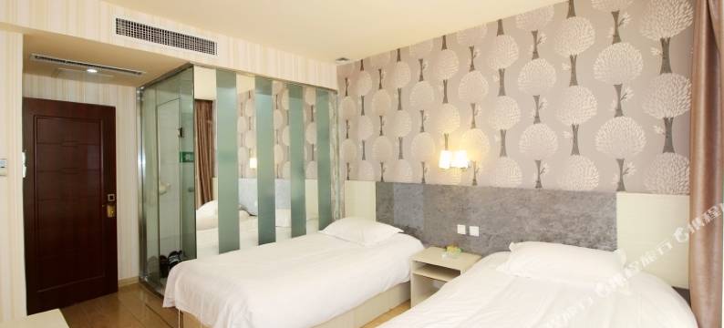 爱客100连锁宾馆(青岛流亭商务区二店)图片