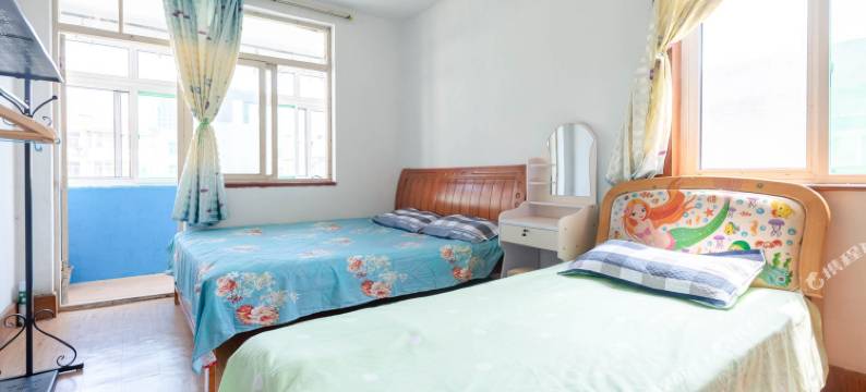 青岛金茂湾团岛海鲜市场隧道口栈桥火车站民宿图片