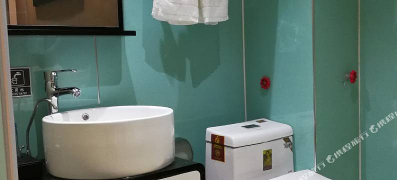 新密麒麟商务酒店(桥头夜市店)图片