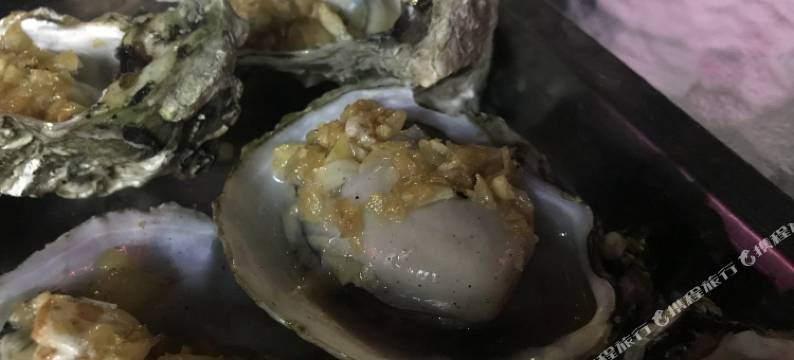 惠州多人出游十里银滩海滨沙滩海景风情民宿图片