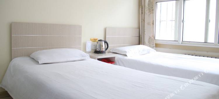 青岛城市客房宾馆图片