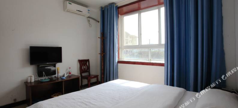 新津忠义商务酒店图片