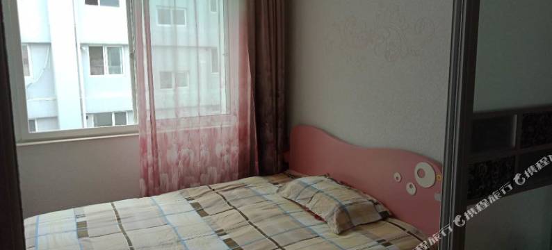 烟台鸿运金秋公寓图片