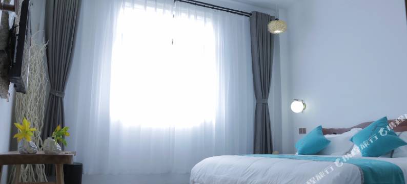 涠洲岛花屿墅(天主教堂贝壳沙滩店)图片