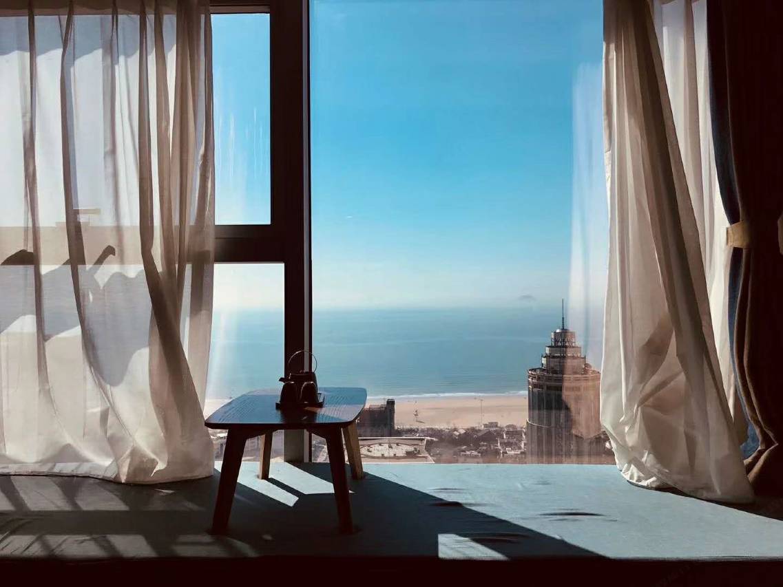 斯维登精品公寓(青岛会展中心石老人海水浴场)图片