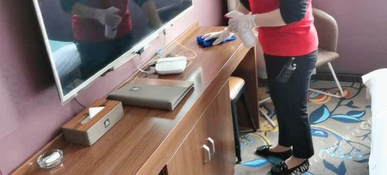 新密麒麟商务酒店(桥头夜市店)图片