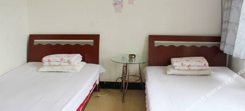 明伟招待所(威海文登新汽车站店)图片