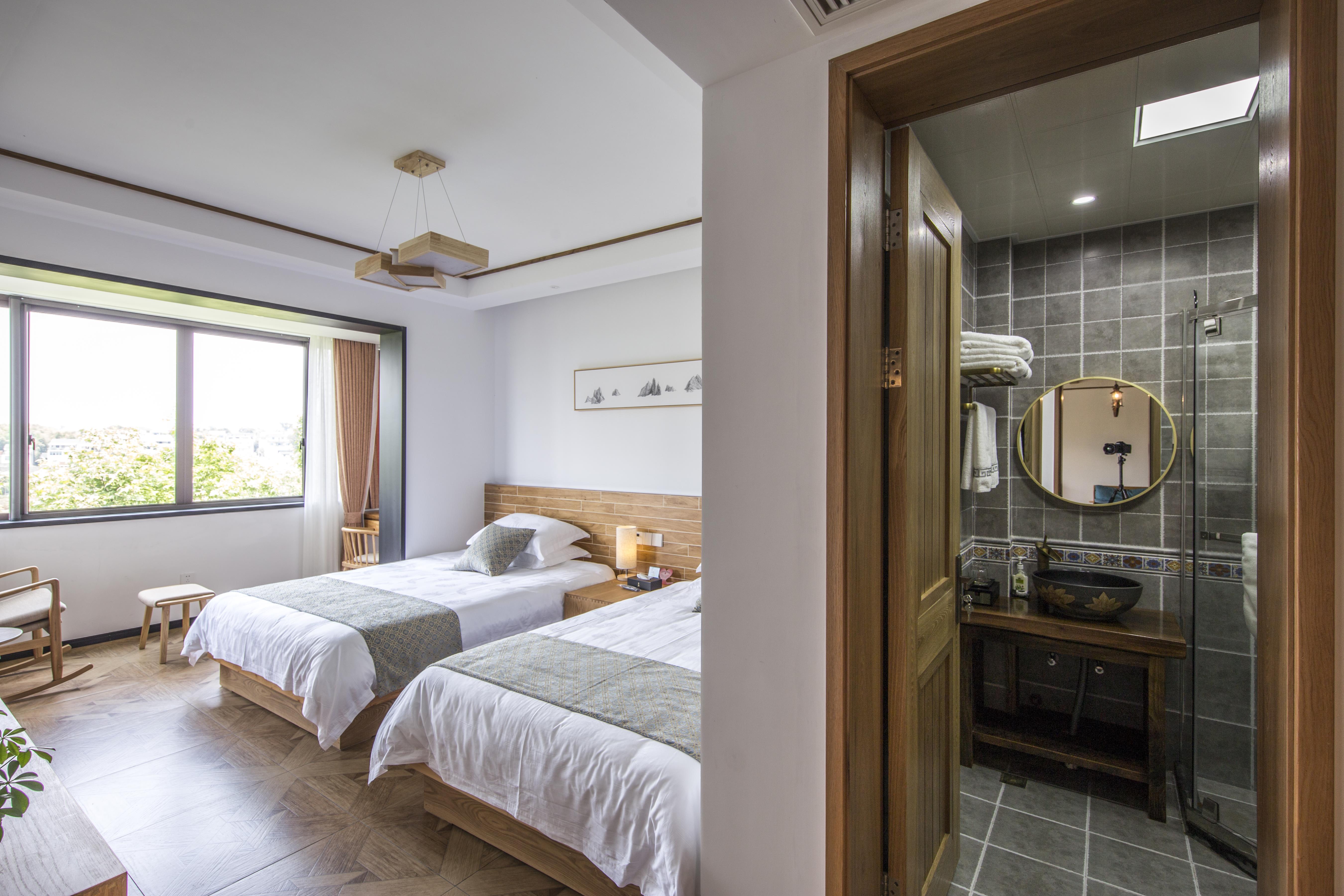 Xinchang Meets A Resident of XishanOver view