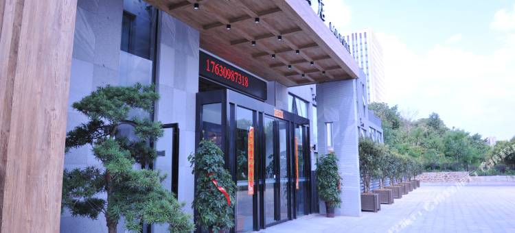 信阳蘭酒店(市政府羊山外国语小学店)图片