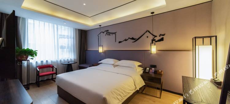 陌上轻居酒店(信阳火车站天润广场店)图片