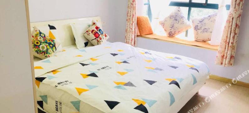 南充绸都名宿公寓图片