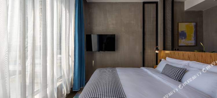 淘元漫居酒店(宁波高教园区店)图片