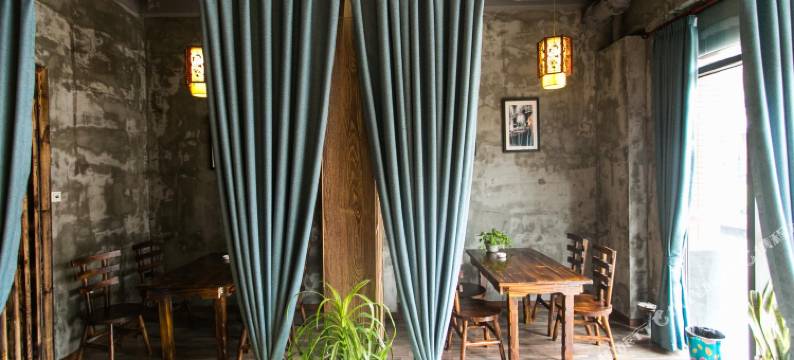 苏州圆石小歇主题宾馆(苏州科技大学石湖校区店)图片