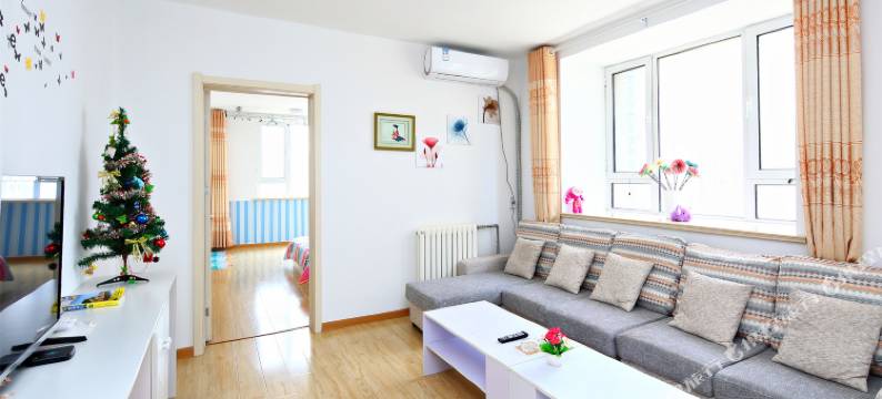 青岛惠风畅畅公寓图片