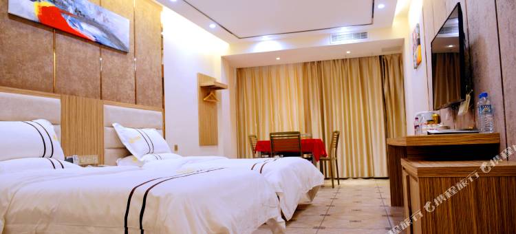 兴仁E恋主题酒店图片