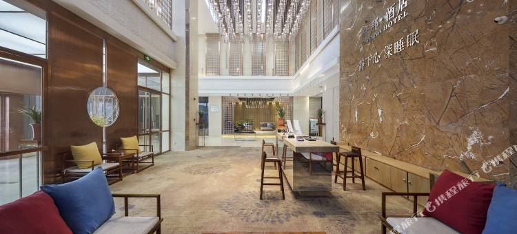 仟那酒店(中原国际博览中心凤凰台地铁站店)图片