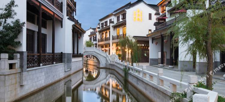 弥勒喜乐院酒店(湖泉水乡旅游度假区店)图片