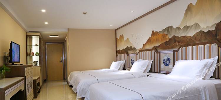 营口晟鼎裕龙阁商务酒店(万达广场金刚山店)图片