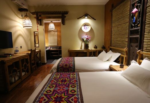 Puzhehei Yeniu Buluo Inn Hotel Overview