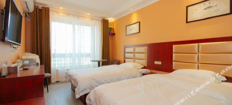 万引力酒店(郑州CBD会展中心中储粮大厦店)图片