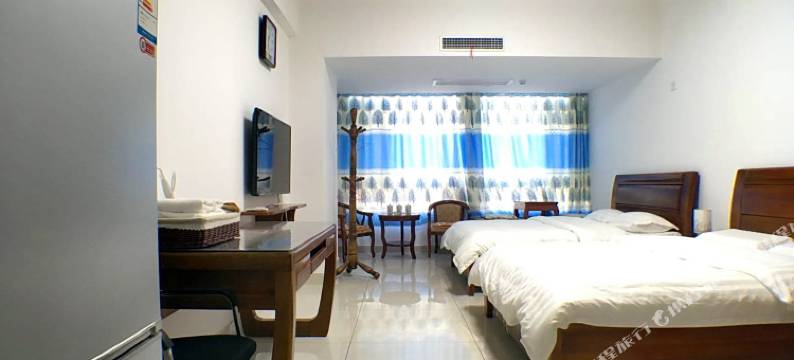 乐天双子星公寓(威海华夏路店)图片