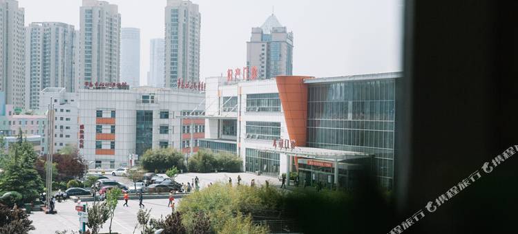 轻住·花朵快捷酒店(青岛同福路妇女儿童医院店)图片