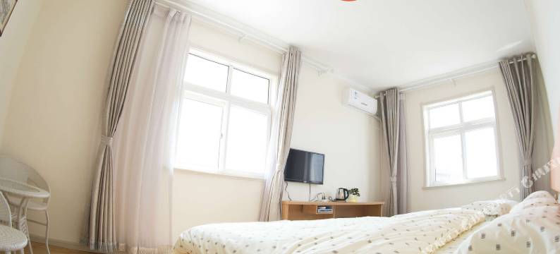 青岛笑盈盈宾馆图片