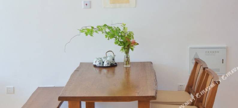 青岛化羽成蝶公寓图片