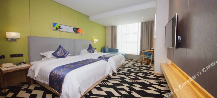 庆阳简格酒店(昊鑫时代广场小什字商业街店)图片