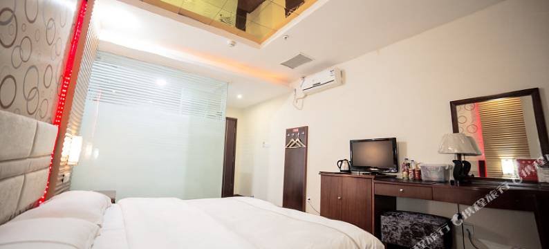 鑫海精品酒店(南充五星花园沃尔玛店)图片