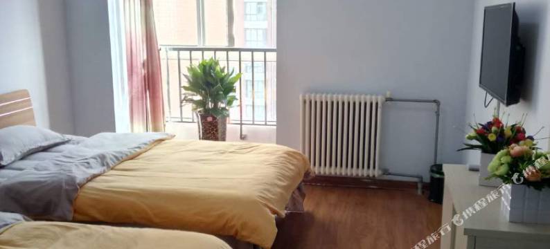 郑州悠然居青旅(郑东万象城高铁东站店)图片