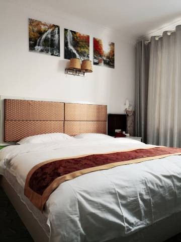 住哲酒店(遵义茅草铺店)