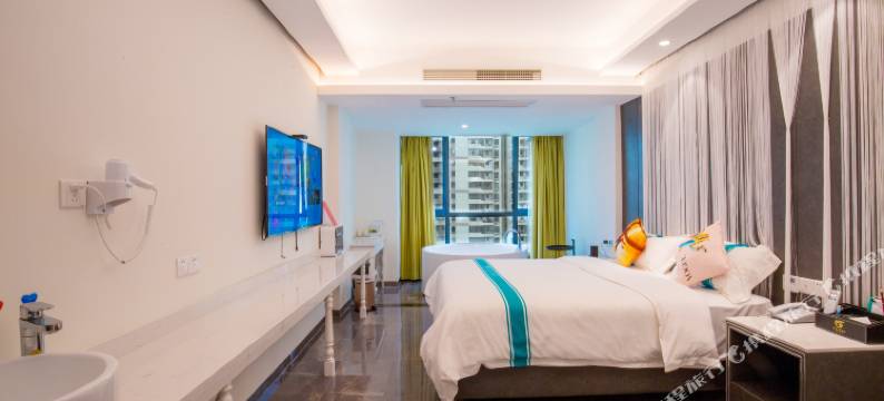 海口绿橙主题酒店(高铁东站吾悦广场店)图片