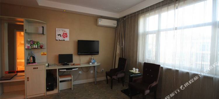 巴彦淖尔市临河区庆丰西街雅欣商务宾馆图片