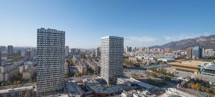 达人主题公寓(泰安万达广场店)图片