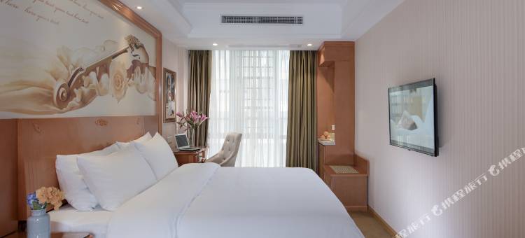 维也纳酒店(龙海角美万益广场店)图片