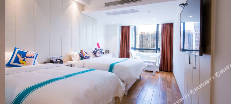 海口绿橙主题酒店(高铁东站吾悦广场店)图片