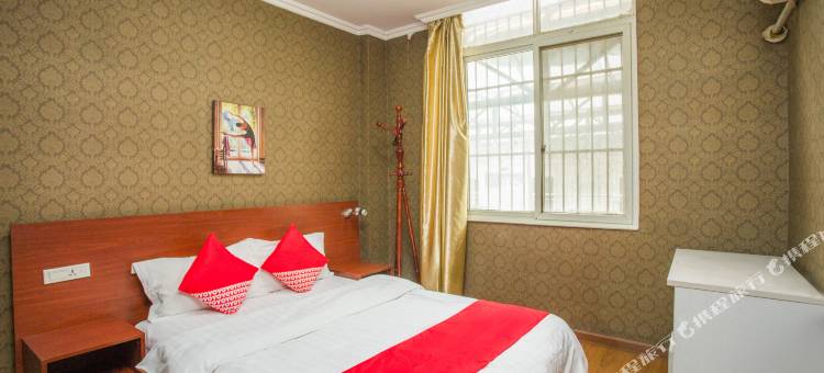 OYO十堰馨起点商务宾馆图片