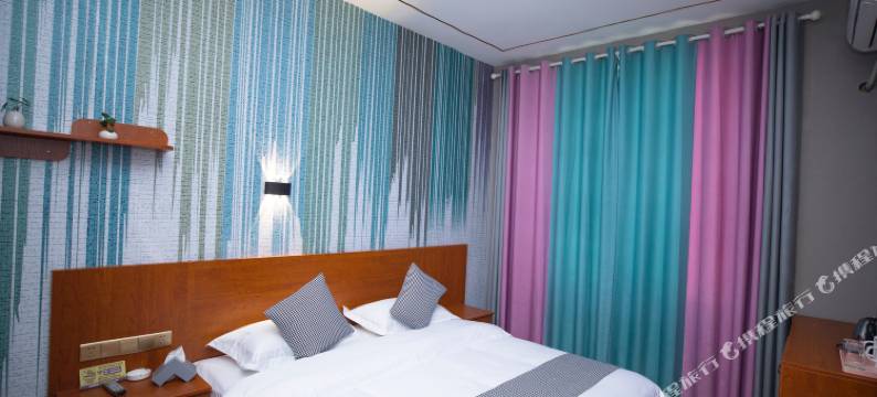 锦辉商务酒店(弥勒湖泉生态园巨人世纪广场店)图片