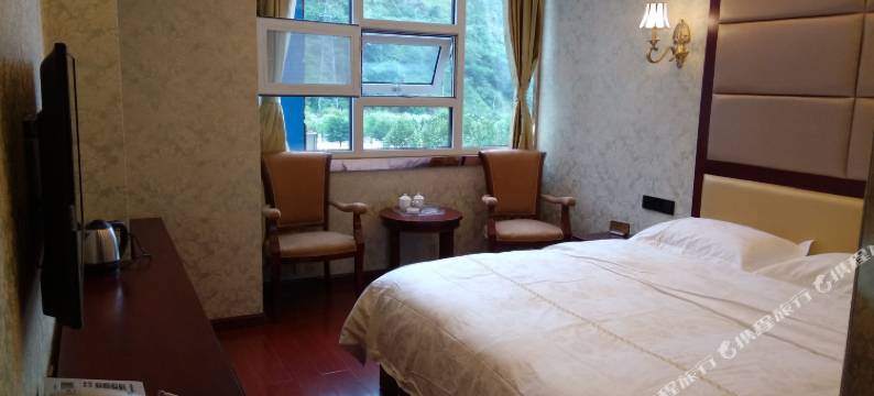 石棉聚能商务酒店图片