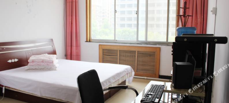 明伟招待所(威海文登新汽车站店)图片