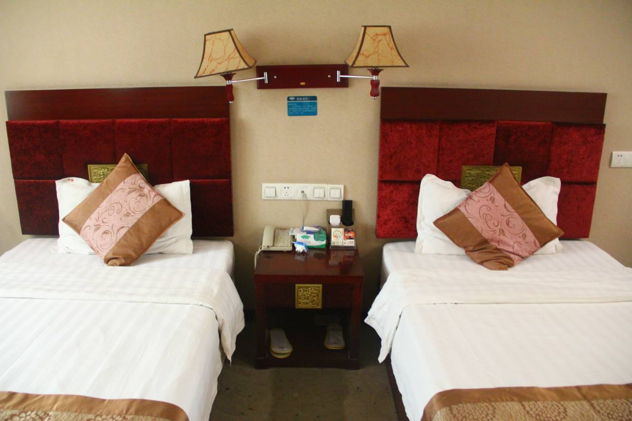 茌平聊城颐轩商务宾馆(车站店)