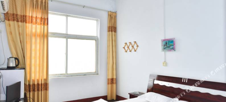 鲁山锦龙轻旅酒店(尧山大峡谷漂流店)图片