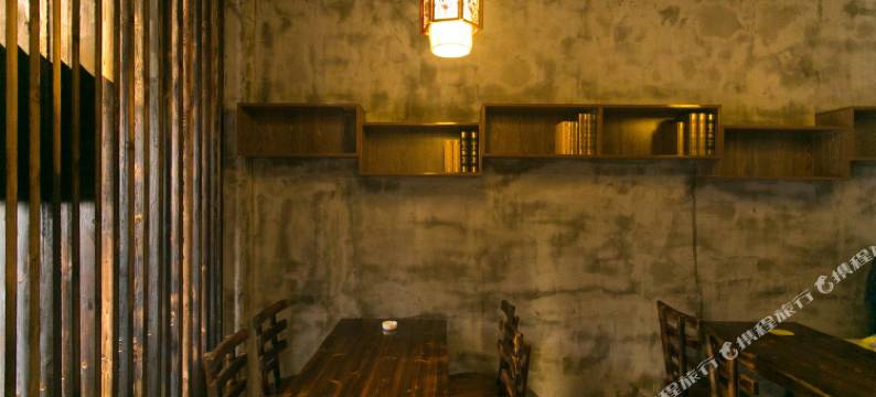 苏州圆石小歇主题宾馆(苏州科技大学石湖校区店)图片