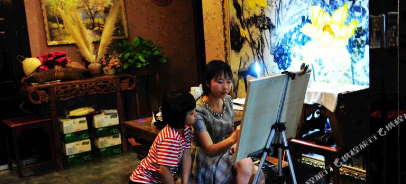 西昌紫楝花客栈(邛海湿地店)图片