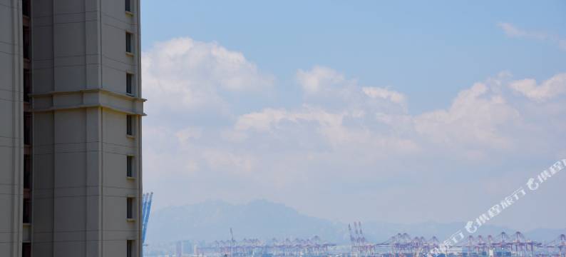 青岛化羽成蝶公寓图片