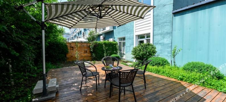 丽呈雅客小镇酒店(青年路中车轨道店)图片