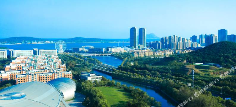 青岛鑫龙假日酒店(黄岛金沙滩石油大学地铁站店)图片